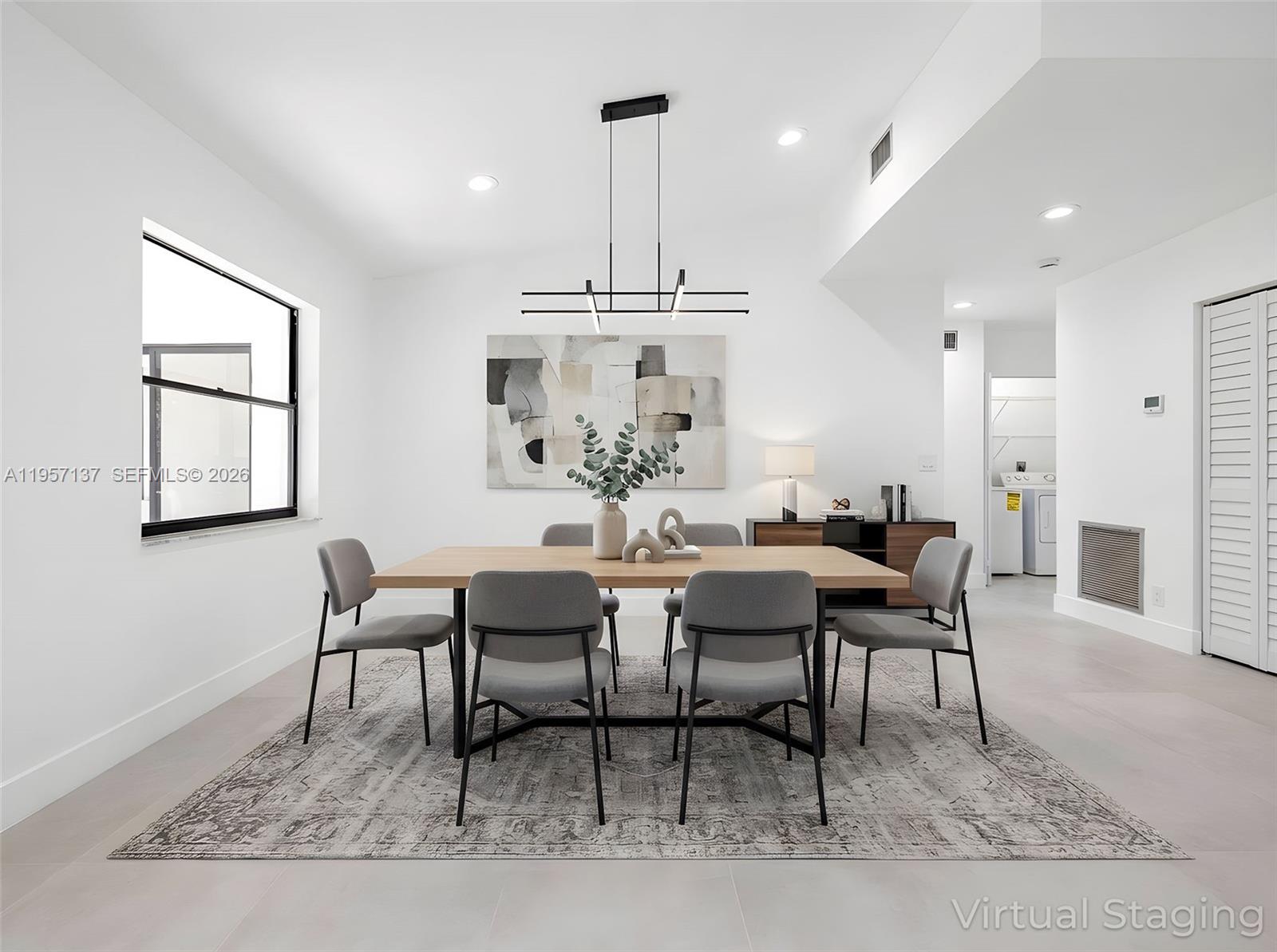 10988 Lake Front Place Boca Raton, FL 33498 - Photo 7 of 85 a view of a dining room with furniture