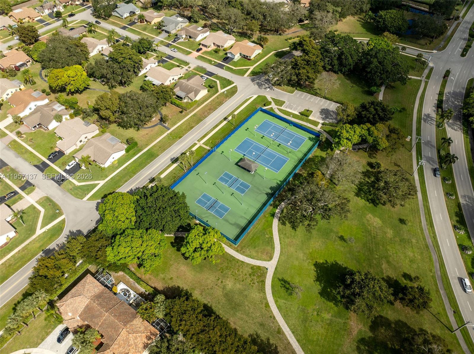 10988 Lake Front Place Boca Raton, FL 33498 - Photo 81 of 85 an aerial view of a residential houses with outdoor space