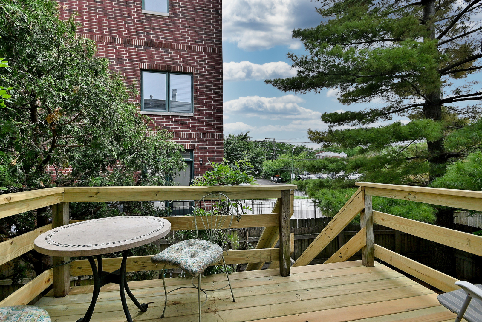 2350 North Sayre Avenue, Unit G Chicago, IL 60707 - Photo 24 of 30 a view of a chairs and table in the balcony