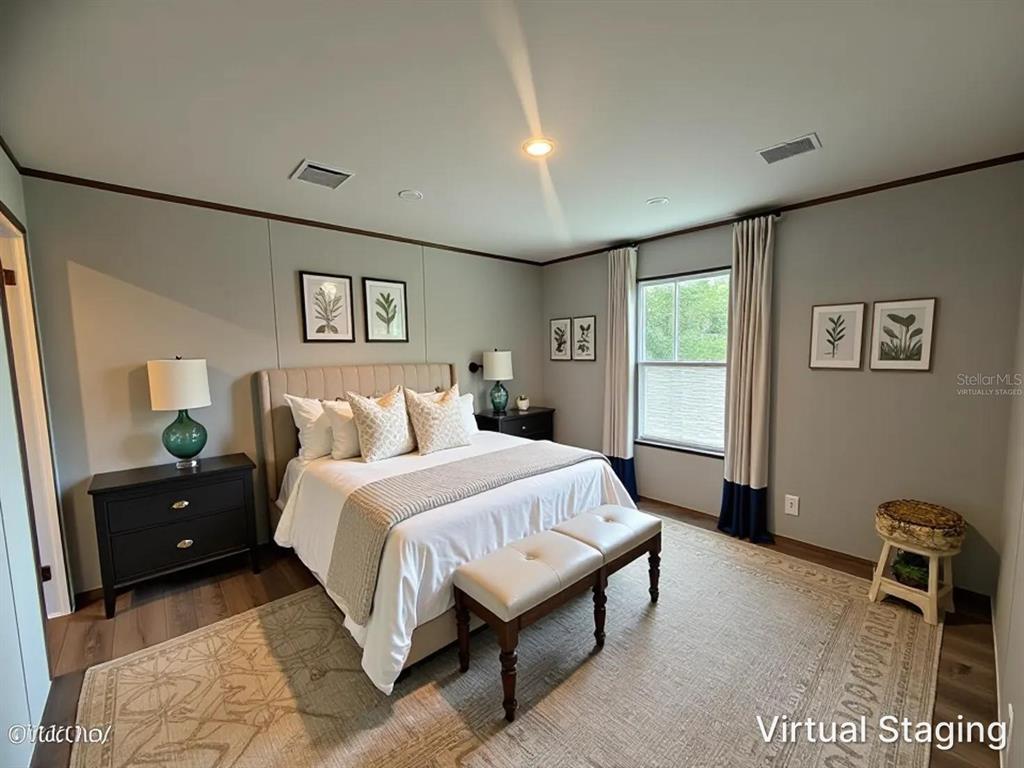 114 Nutmeg Trail Interlachen, FL 32148 - Photo 21 of 33 a spacious bedroom with a bed and a dresser in it