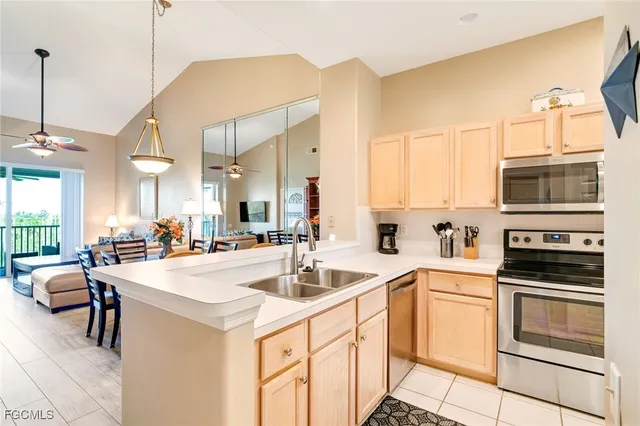 a kitchen with counter top space and appliances
