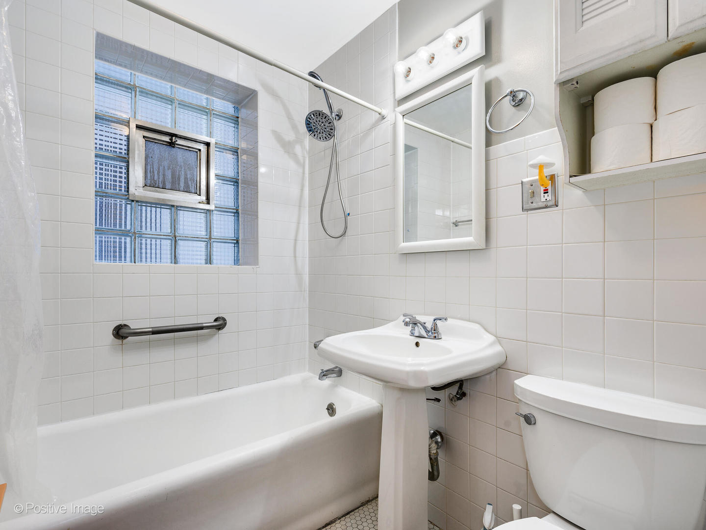 3016 South Throop Street Chicago, IL 60608 - Photo 11 of 32 a bathroom with a sink toilet and shower