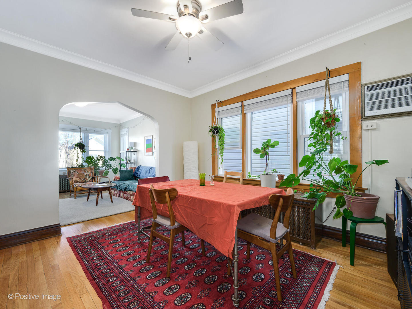 3016 South Throop Street Chicago, IL 60608 - Photo 15 of 32 a view of a dining room with furniture window and wooden floor