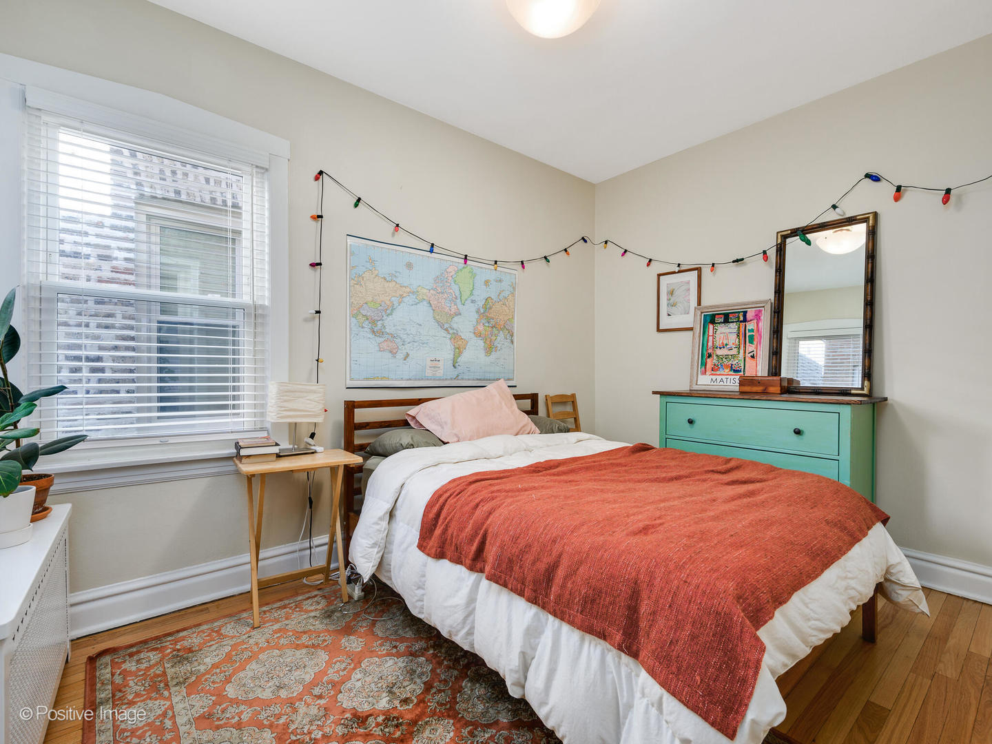 3016 South Throop Street Chicago, IL 60608 - Photo 18 of 32 a bed room with a bed and a chair