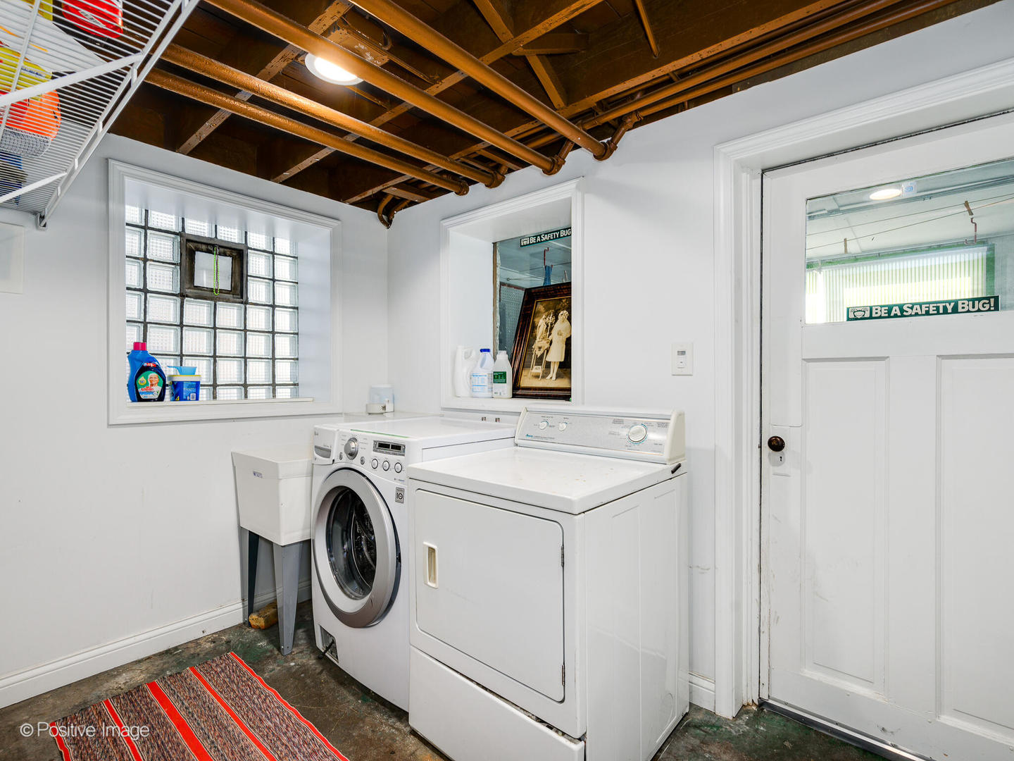 3016 South Throop Street Chicago, IL 60608 - Photo 28 of 32 a utility room with dryer and washer
