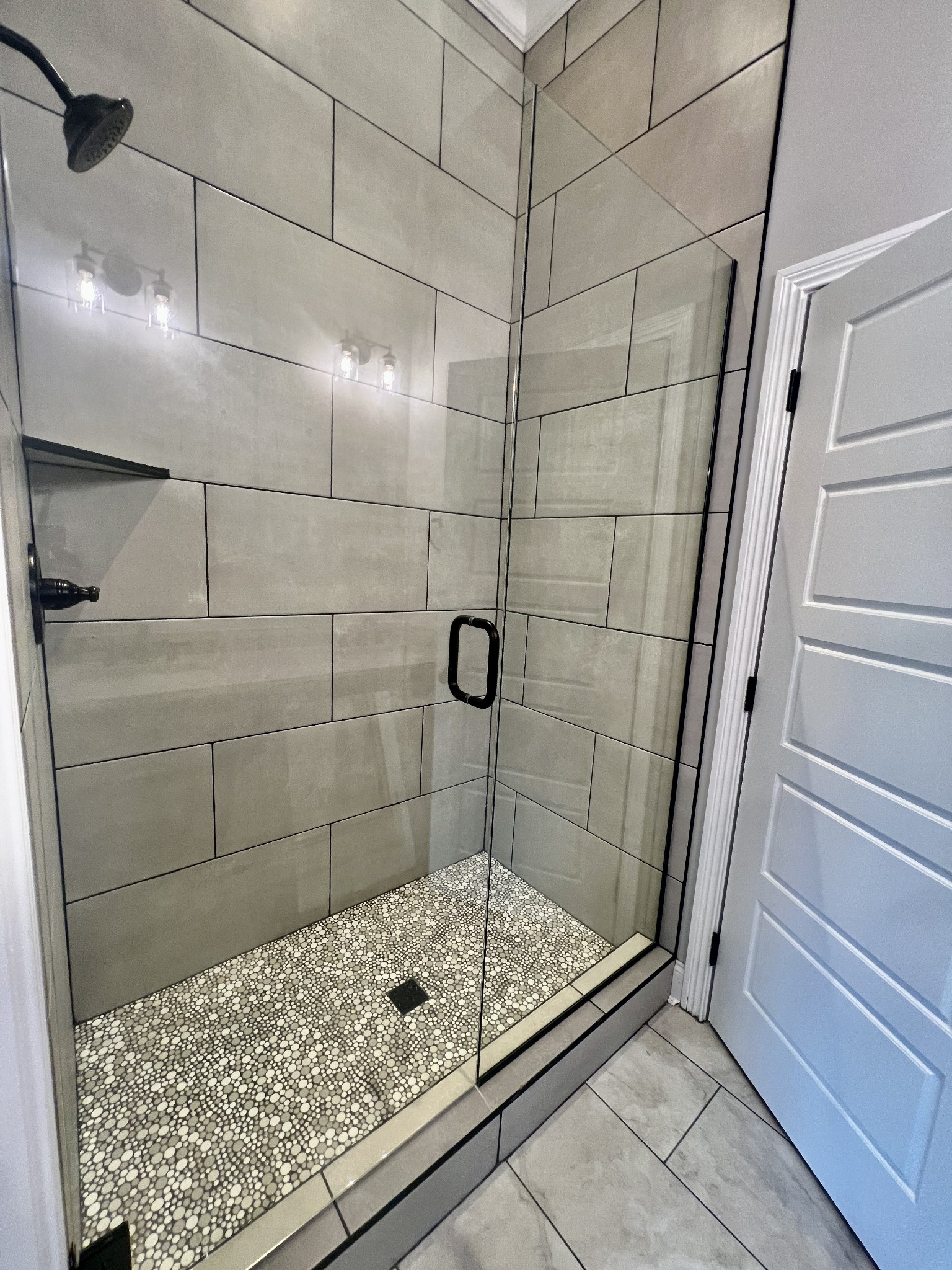 557 Hiwassee Road Lebanon, TN 37087 - Photo 14 of 27 a bathroom with a shower