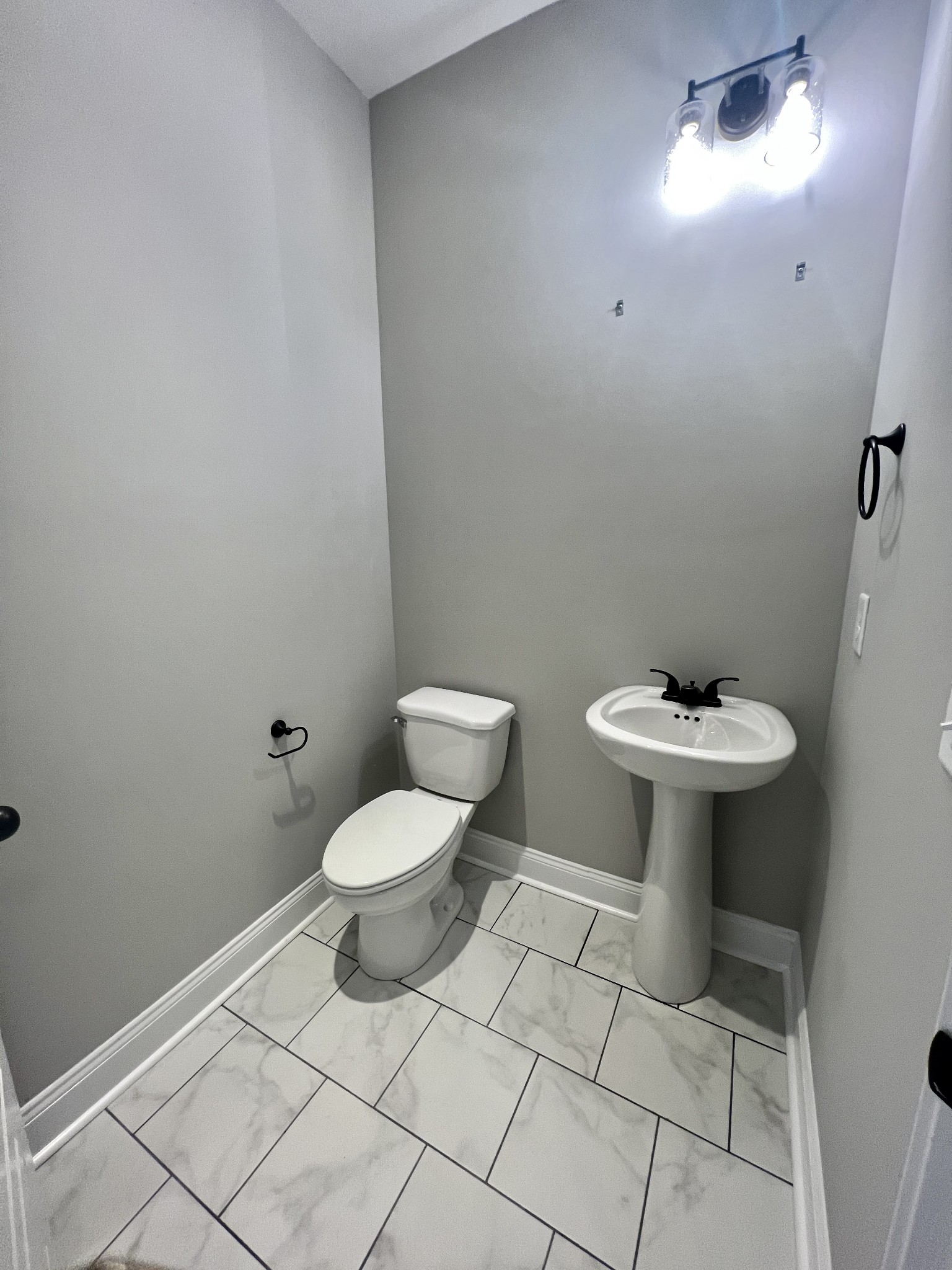557 Hiwassee Road Lebanon, TN 37087 - Photo 18 of 27 a bathroom with a sink toilet and a mirror