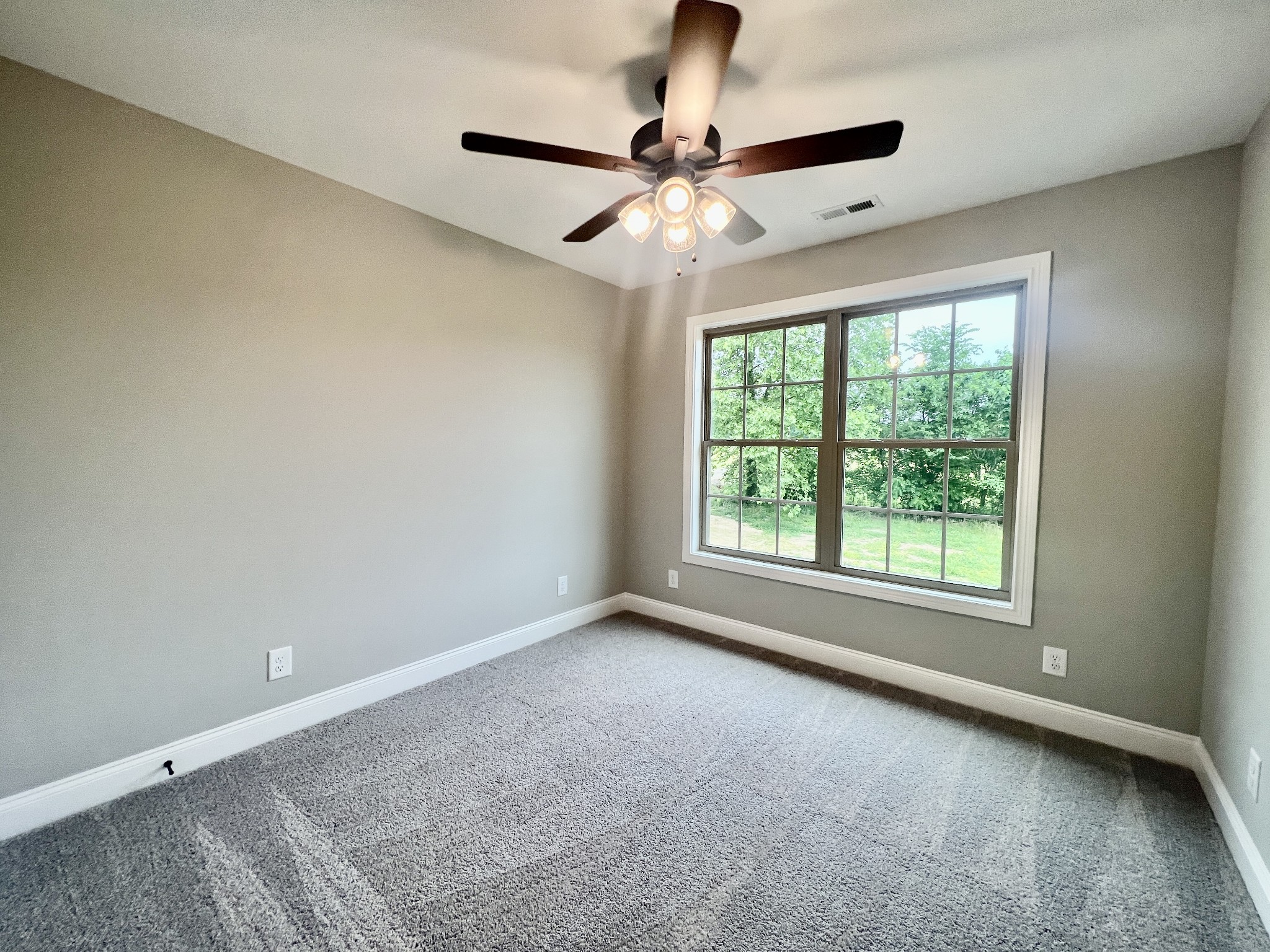557 Hiwassee Road Lebanon, TN 37087 - Photo 19 of 27 wooden floor in an empty room with a window