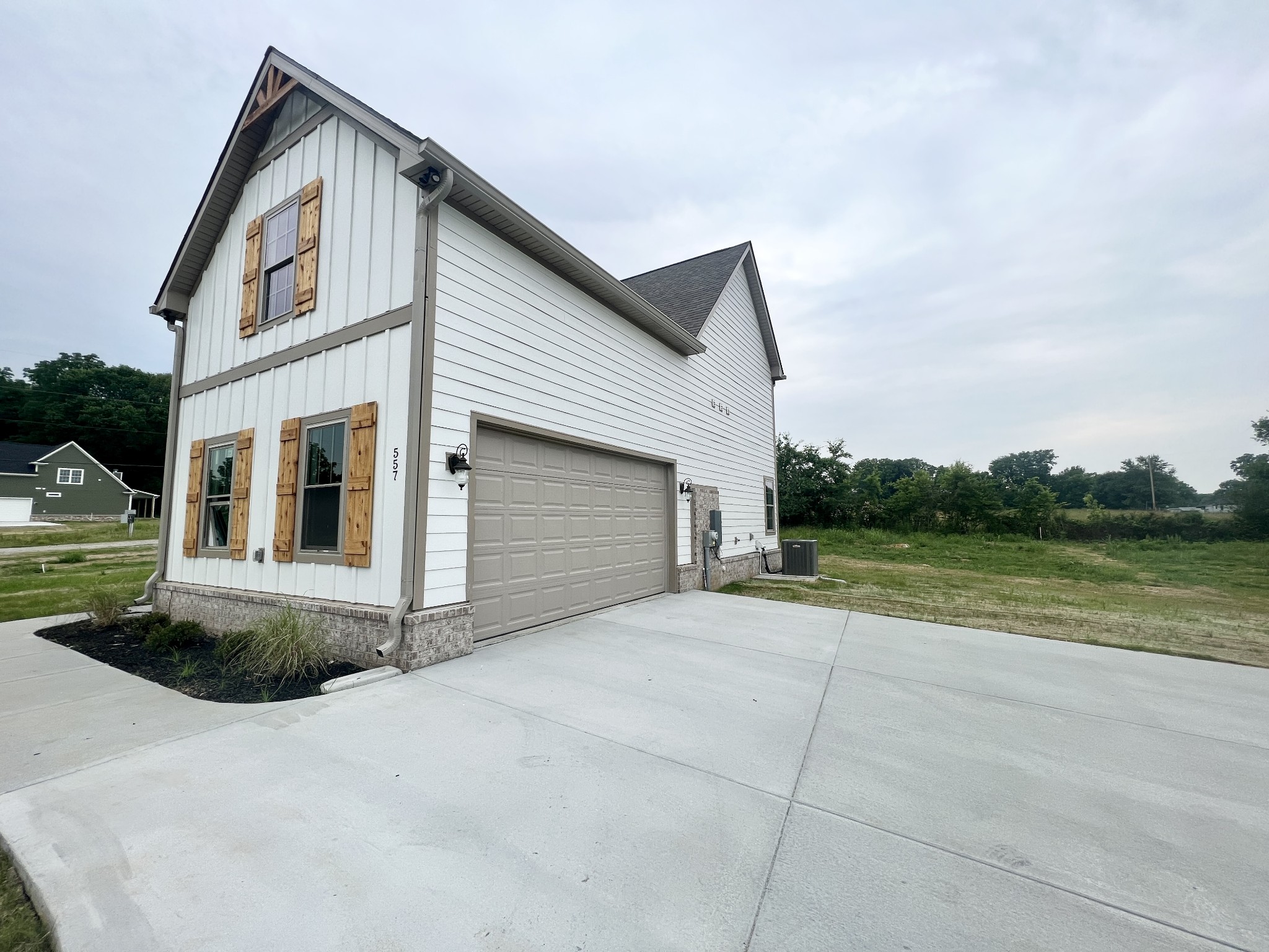 557 Hiwassee Road Lebanon, TN 37087 - Photo 27 of 27 a view of a house with backyard and garden