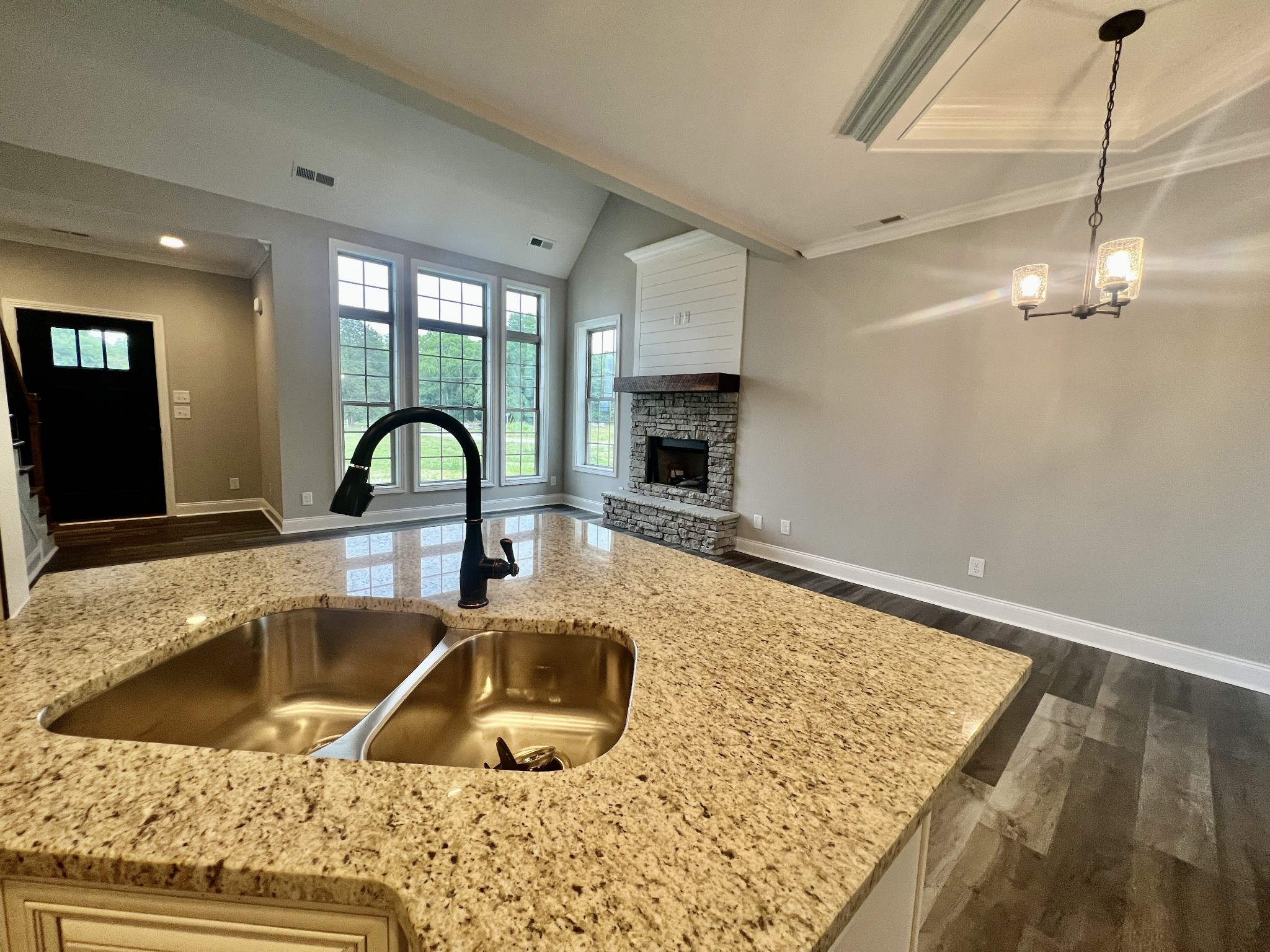 557 Hiwassee Road Lebanon, TN 37087 - Photo 8 of 27 a kitchen with a sink a counter top space and a view of living room