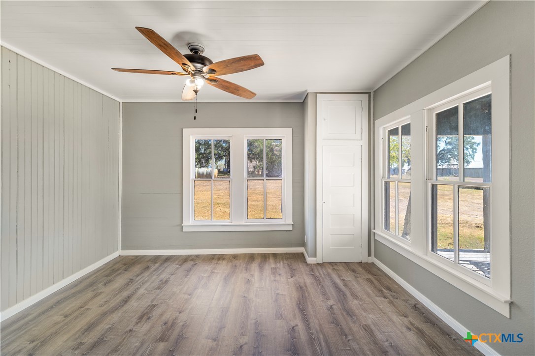 2205 Meyersville Road Meyersville, TX 77974 - Photo 17 of 22 a view of a livingroom with a ceiling fan and window
