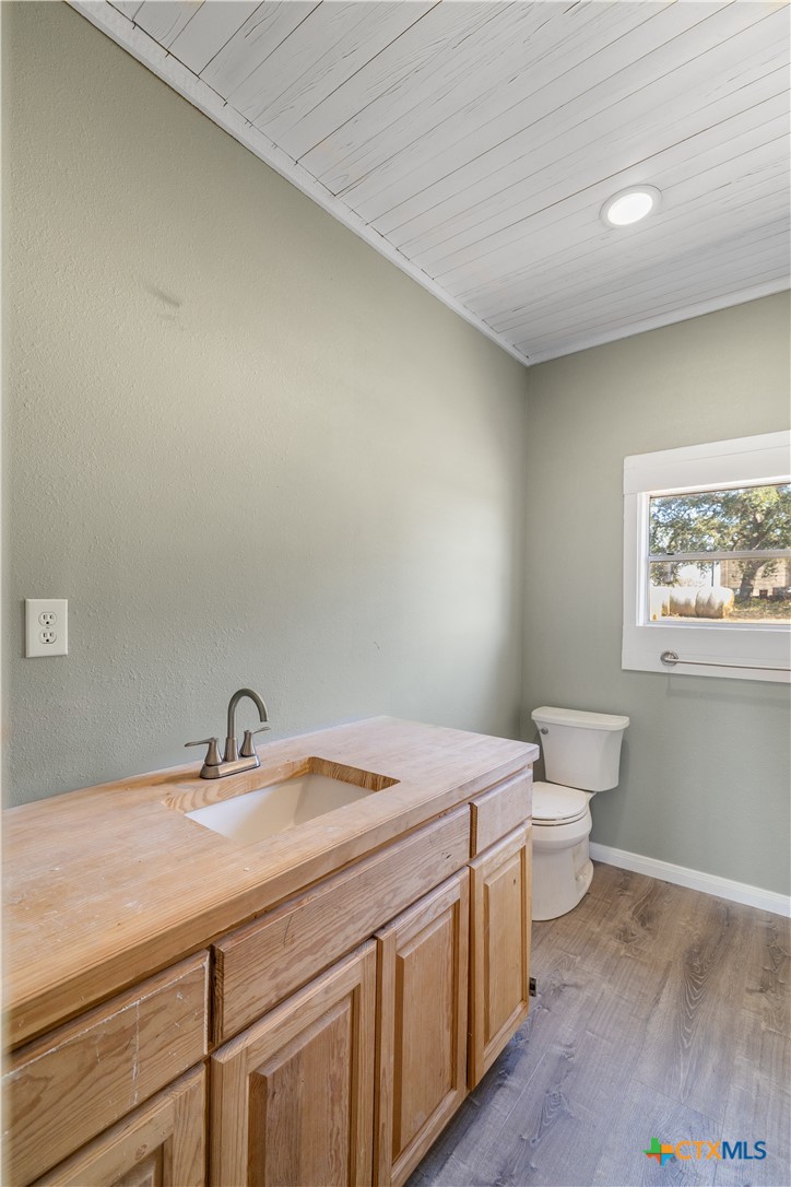 2205 Meyersville Road Meyersville, TX 77974 - Photo 18 of 22 a bathroom with a sink and a toilet