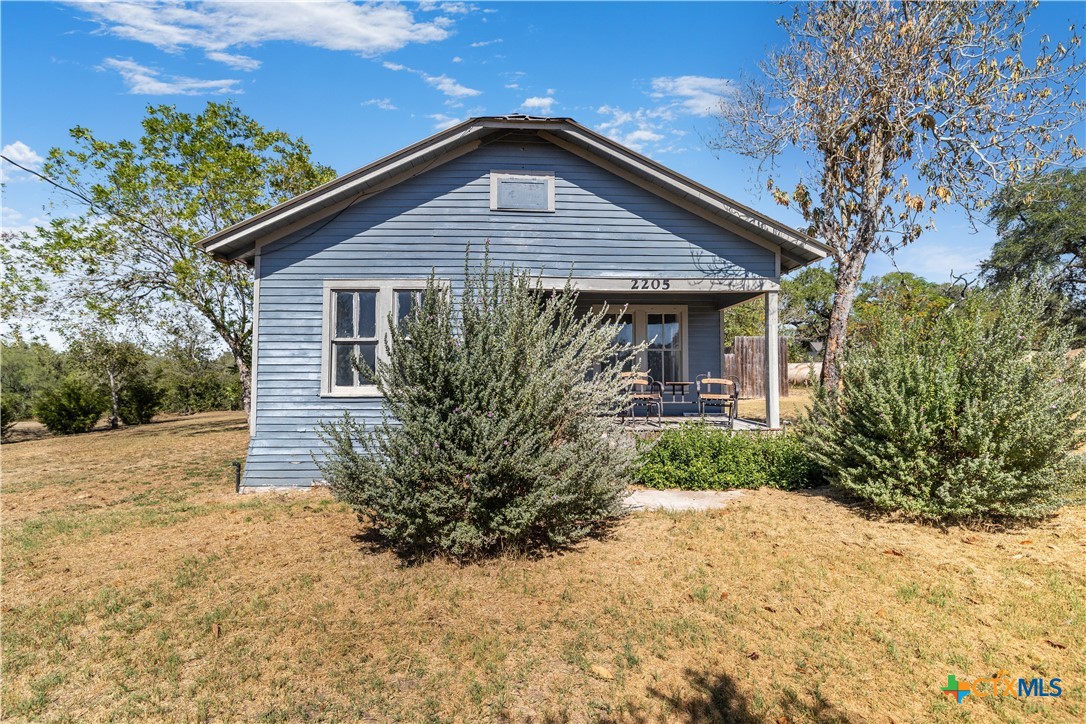 2205 Meyersville Road Meyersville, TX 77974 - Photo 3 of 22 a front view of house with yard and trees around