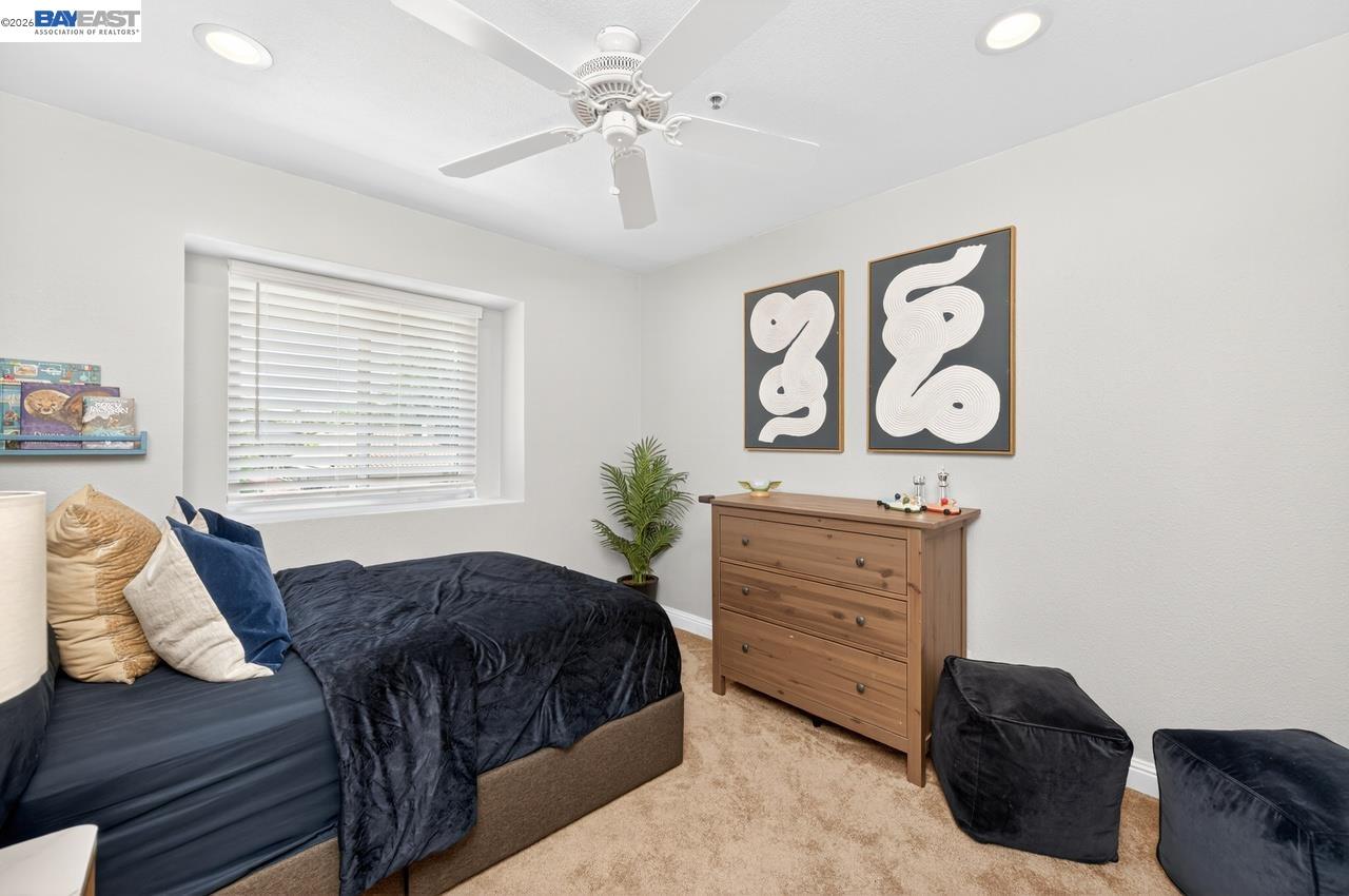 308 Mulqueeney Street Livermore, CA 94550 - Photo 17 of 51 a bedroom with a bed and a window