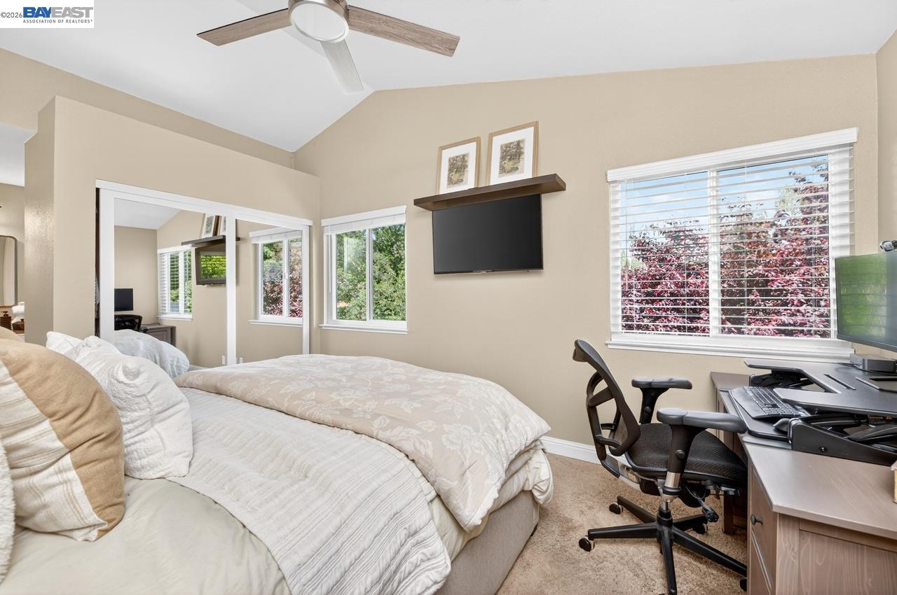 308 Mulqueeney Street Livermore, CA 94550 - Photo 24 of 51 a bedroom with a bed and a flat screen tv