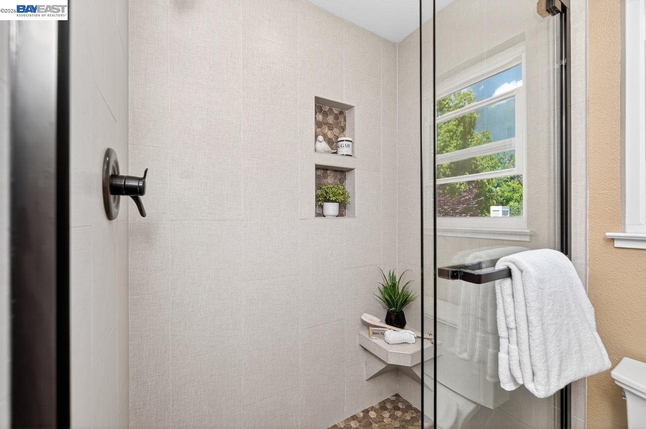 308 Mulqueeney Street Livermore, CA 94550 - Photo 26 of 51 a bathroom with a bathtub and shower