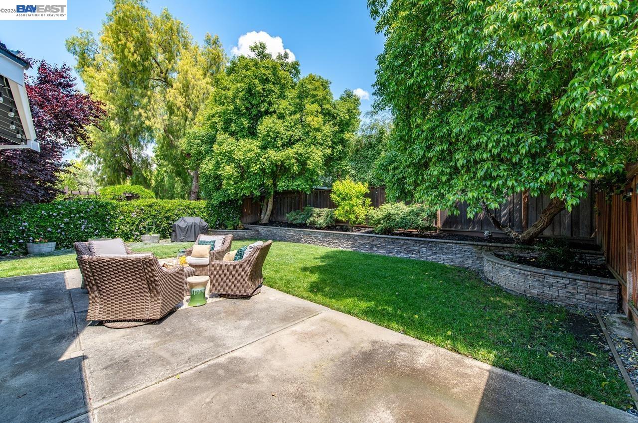 308 Mulqueeney Street Livermore, CA 94550 - Photo 28 of 51 a view of backyard with seating space and trees