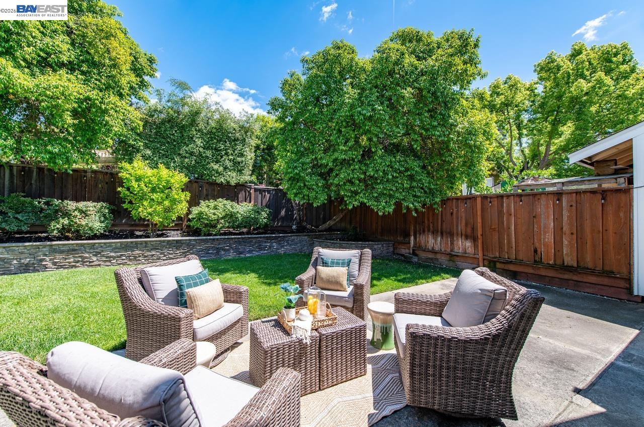 308 Mulqueeney Street Livermore, CA 94550 - Photo 32 of 51 a view of a patio with couches chairs and a table