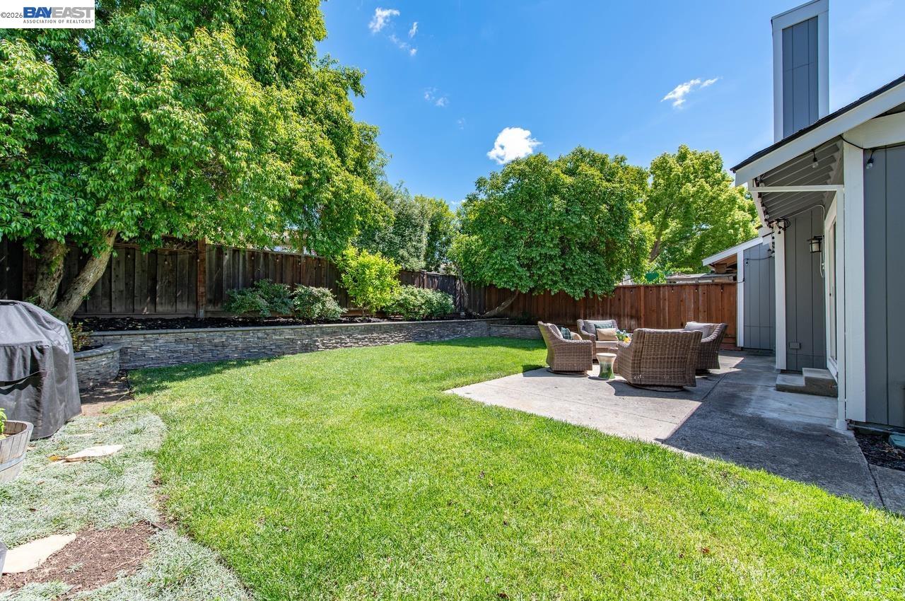 308 Mulqueeney Street Livermore, CA 94550 - Photo 33 of 51 a view of a backyard with furniture and garden