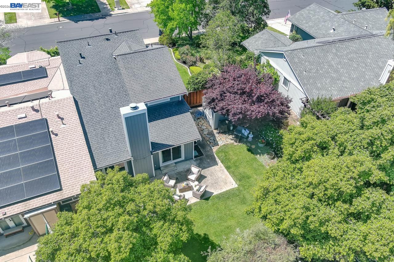 308 Mulqueeney Street Livermore, CA 94550 - Photo 40 of 51 an aerial view of a house with a yard and trees
