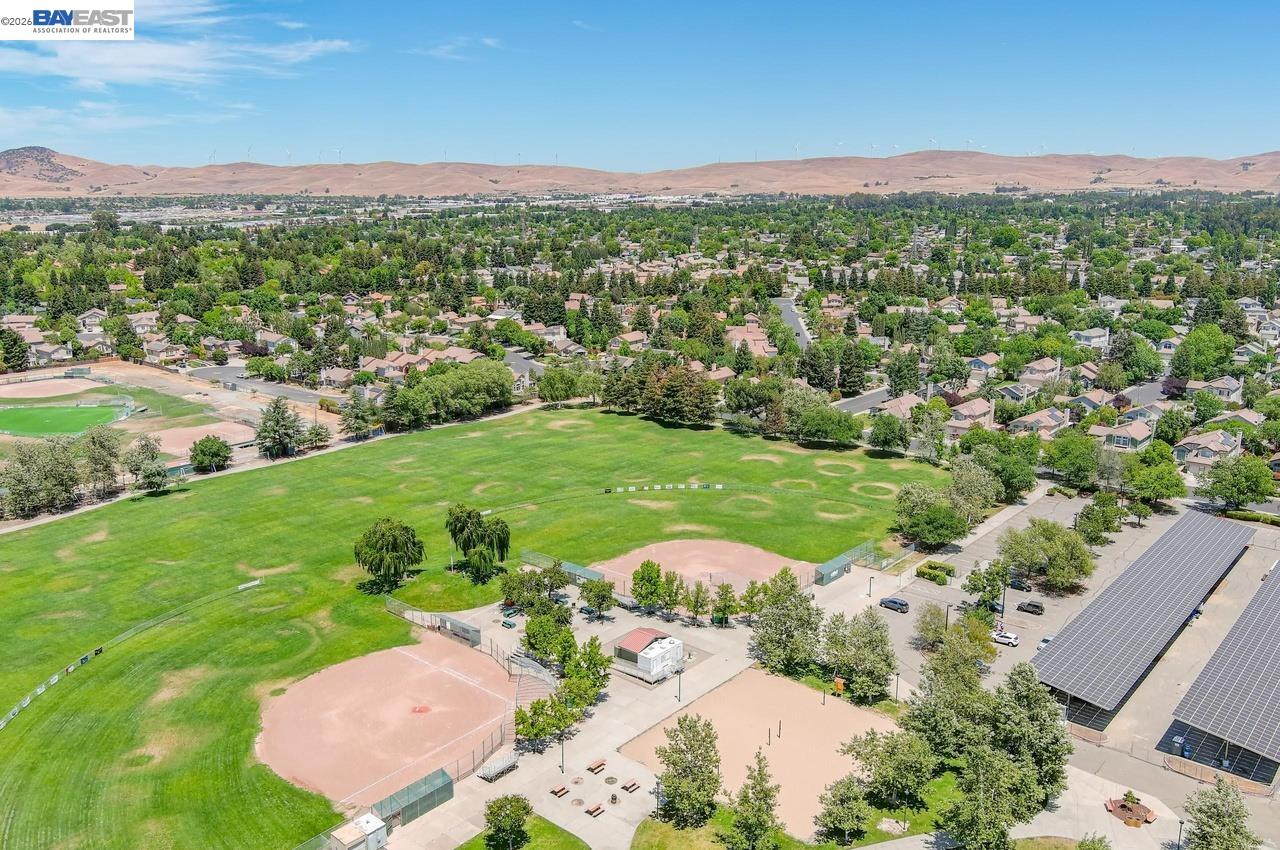 308 Mulqueeney Street Livermore, CA 94550 - Photo 43 of 51 an aerial view of residential houses with outdoor space and trees