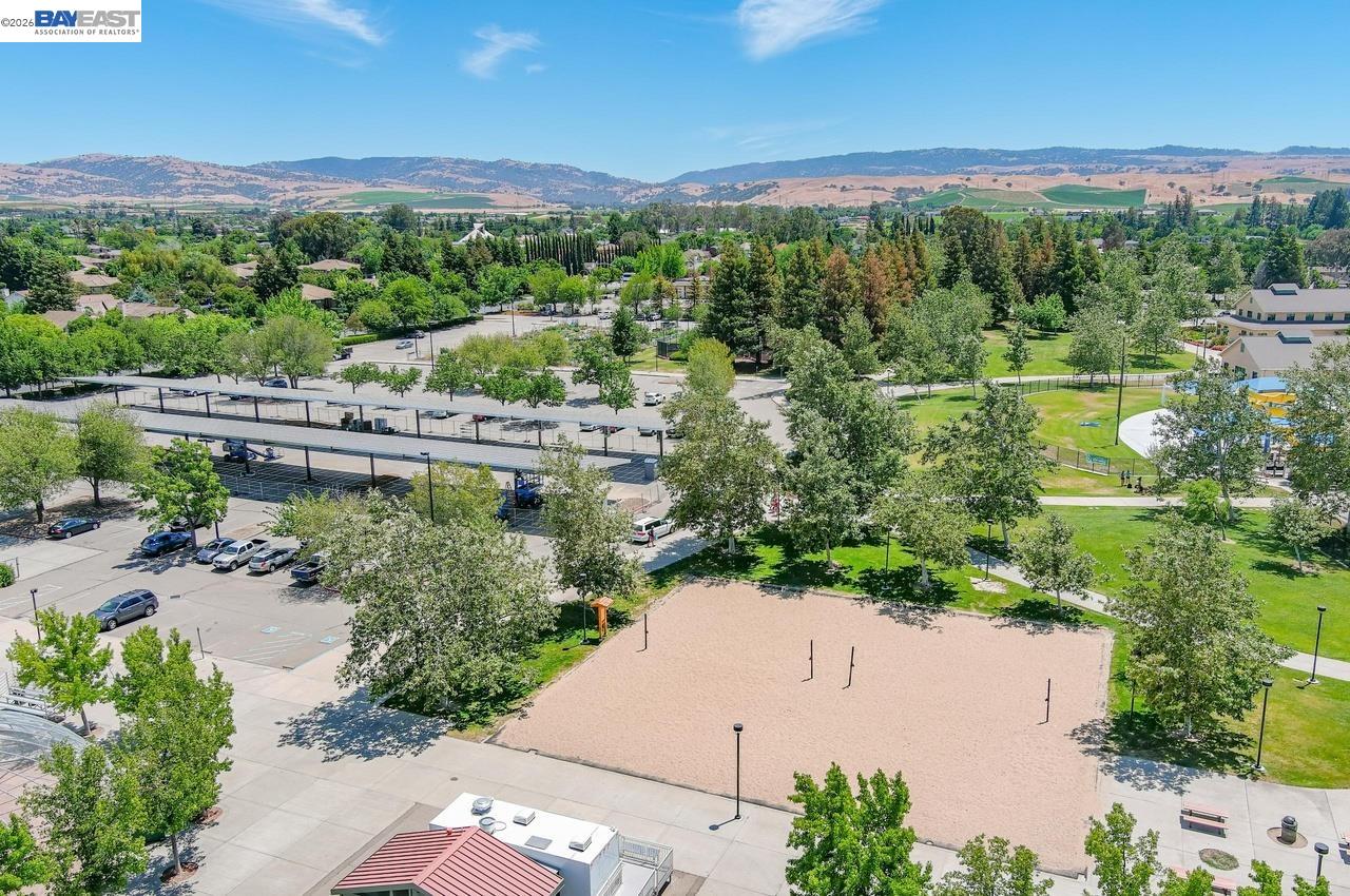 308 Mulqueeney Street Livermore, CA 94550 - Photo 45 of 51 a view of a garden with a lake view