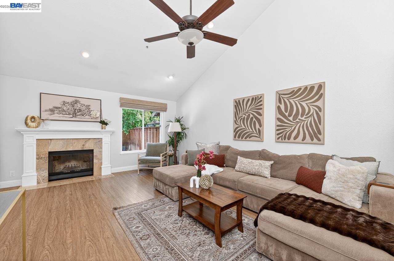 308 Mulqueeney Street Livermore, CA 94550 - Photo 6 of 51 a living room with furniture and a fireplace