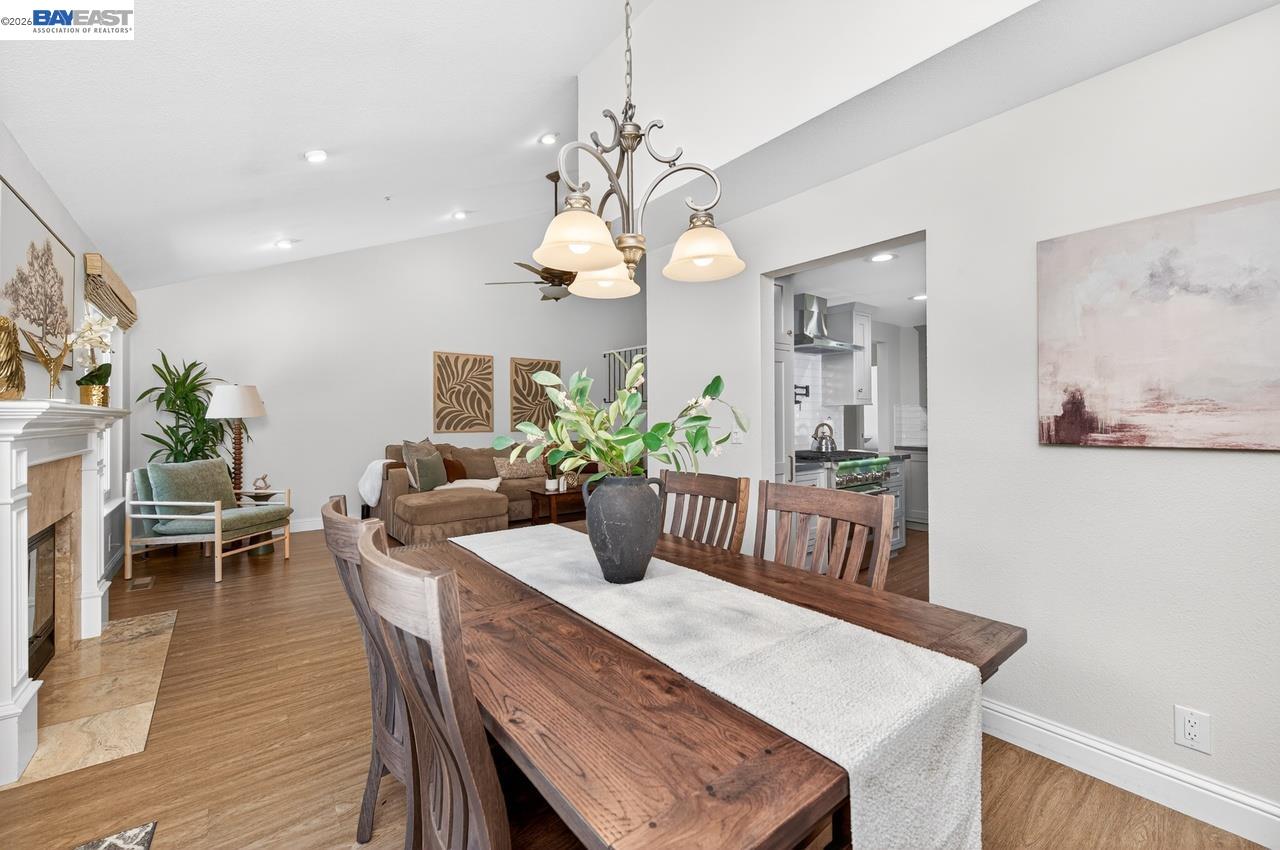 308 Mulqueeney Street Livermore, CA 94550 - Photo 10 of 51 a view of a dining room with furniture and wooden floor