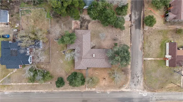 an aerial view of residential house with outdoor space
