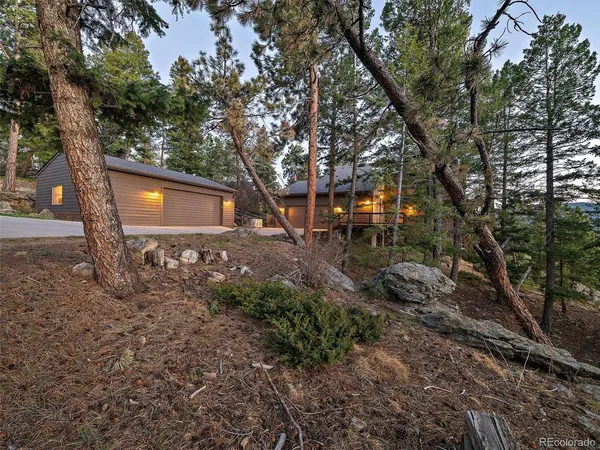 a backyard of a house with lots of green space