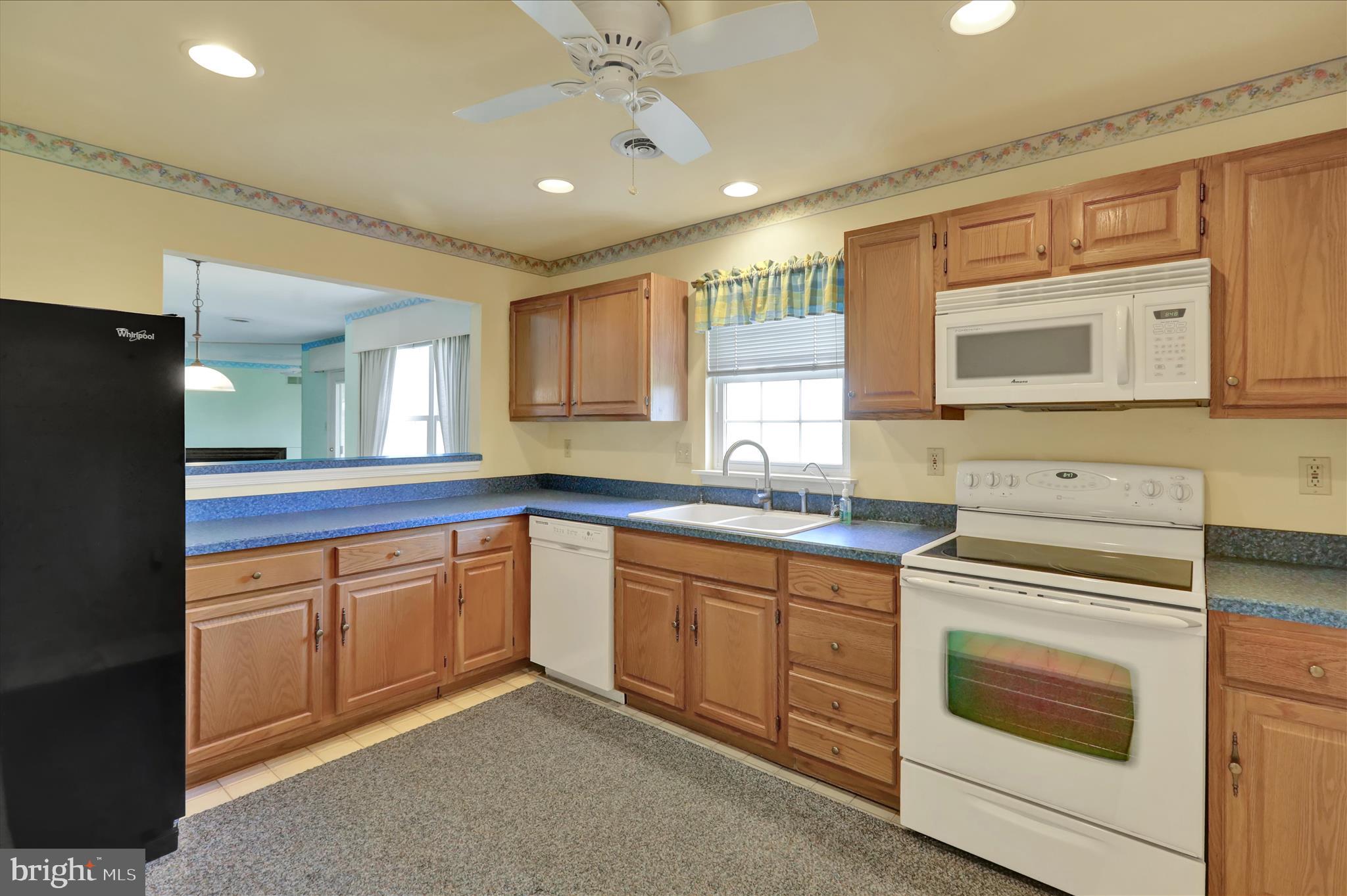 146 Heather Lane Reading, PA 19610 - Photo 10 of 25 a kitchen with white cabinets and white appliances
