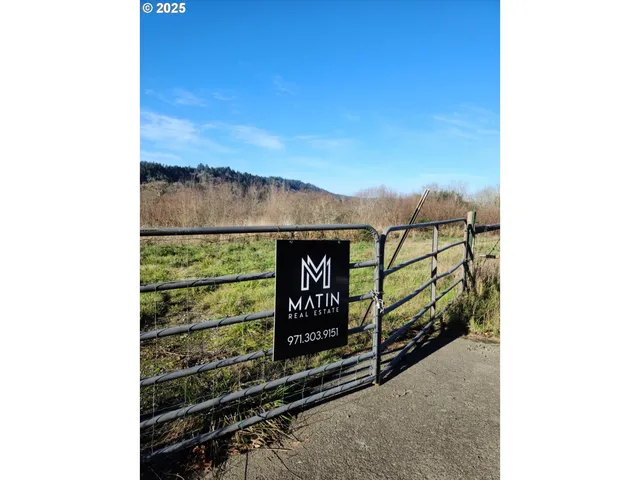 a view of a bench in front of building