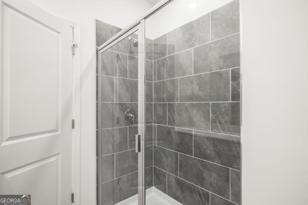 108 Palmetto Avenue Perry, GA 31069 - Photo 19 of 30 a bathroom with a shower