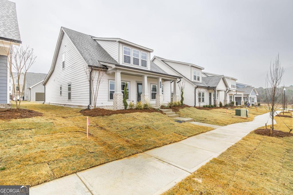 108 Palmetto Avenue Perry, GA 31069 - Photo 2 of 30 a front view of a house with