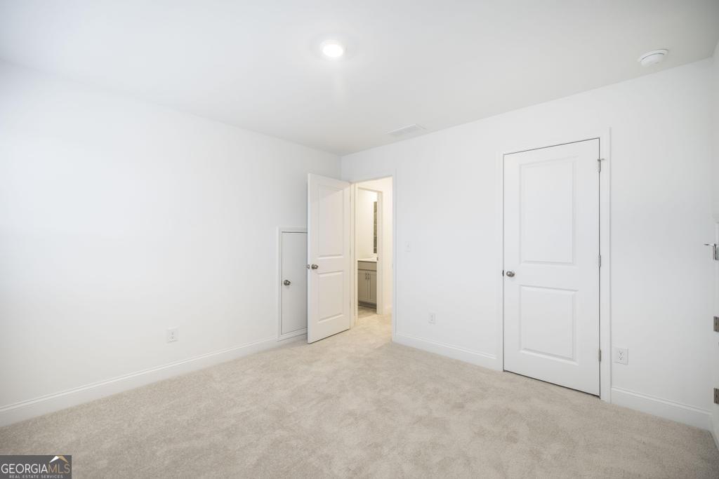 108 Palmetto Avenue Perry, GA 31069 - Photo 27 of 30 a view of an empty room