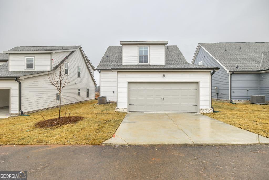 108 Palmetto Avenue Perry, GA 31069 - Photo 29 of 30 a view of a house with a swimming pool