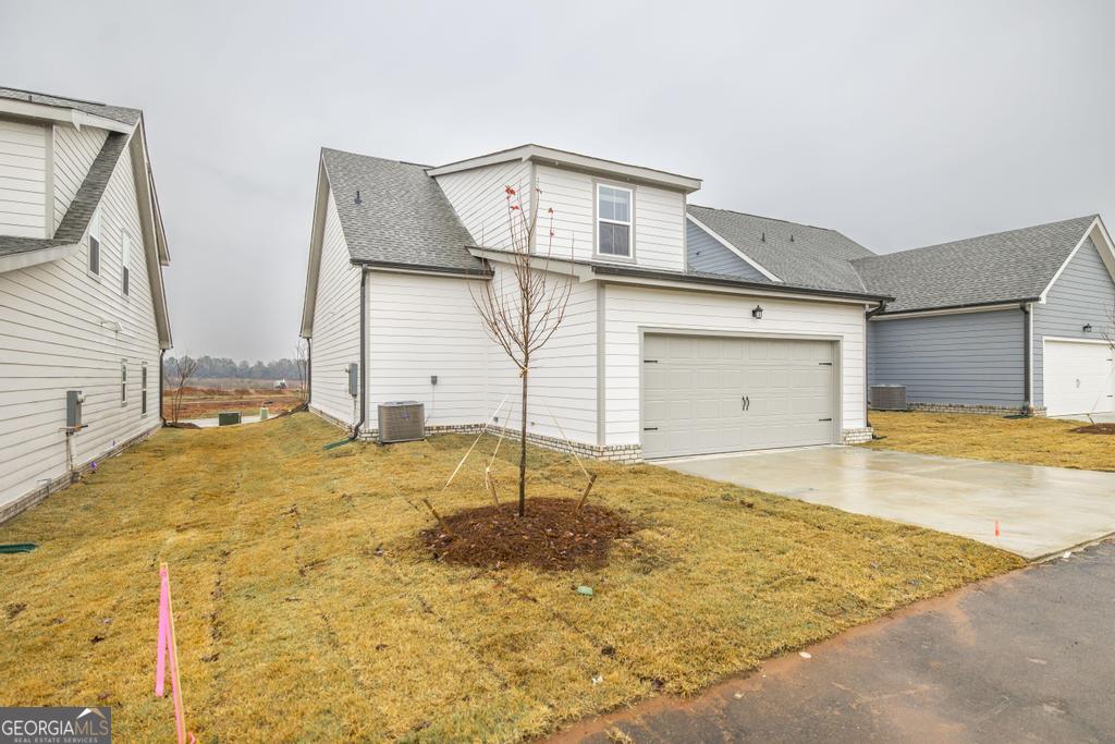 108 Palmetto Avenue Perry, GA 31069 - Photo 30 of 30 a bathroom with a sink and a mirror