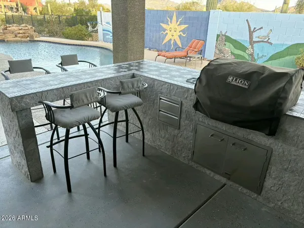 a view of a back yard of the house