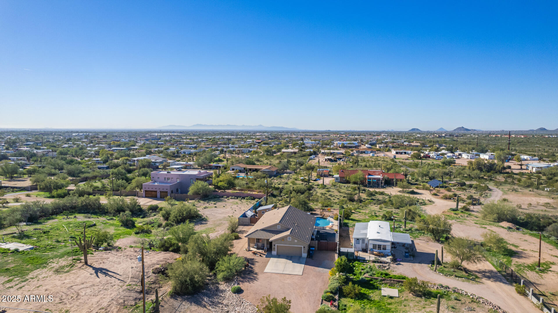 614 North Tomahawk Road Apache Junction, AZ 85119 - Photo 41 of 48 an aerial view of a city with lots of residential buildings