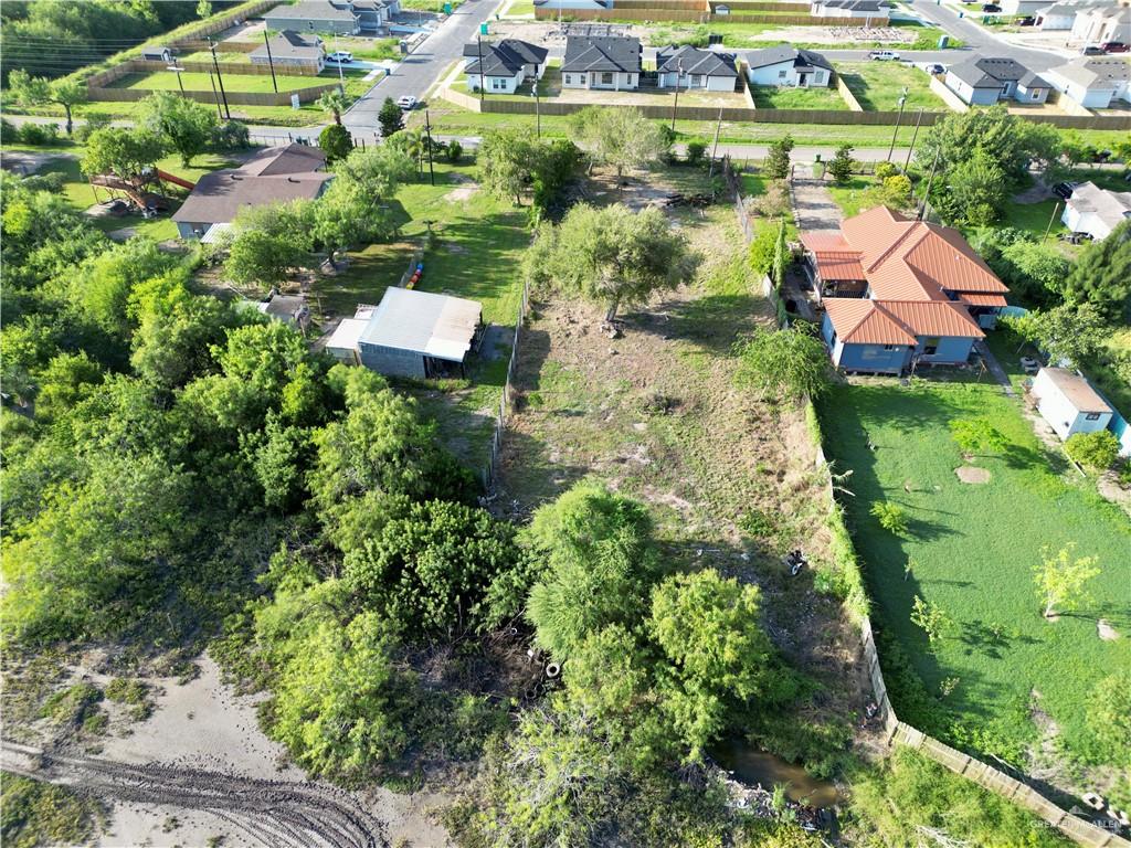 7125 Houston Road Brownsville, TX 78521 - Photo 2 of 9 an aerial view of a house with a garden