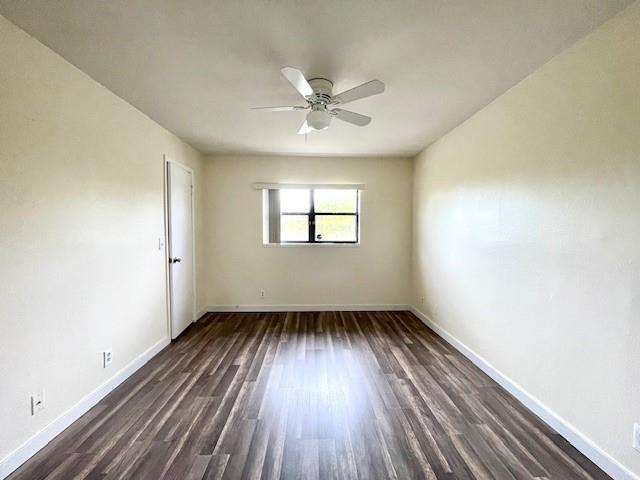 4088 North Pine Island Road, Unit 409 Sunrise, FL 33351 - Photo 8 of 18 wooden floor in an empty room with a window