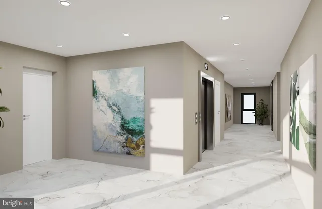 a living room with furniture and a mirror