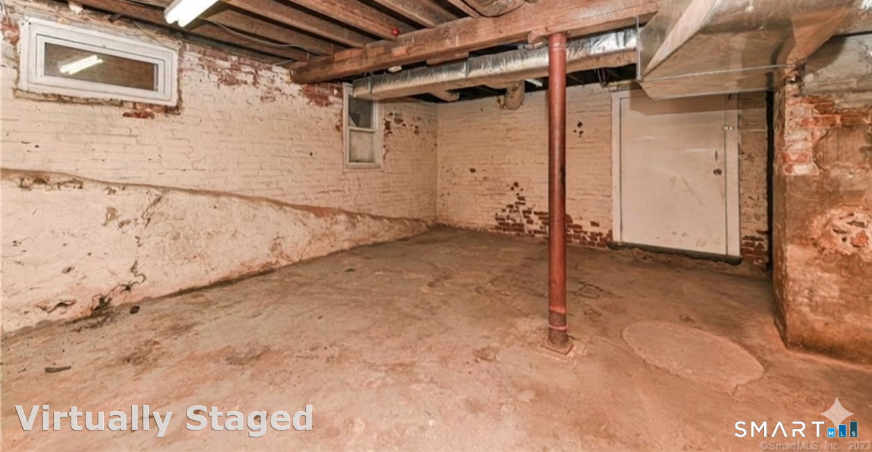 37 Manhan Street Waterbury, CT 06710 - Photo 15 of 19 a view of a room with wooden walls