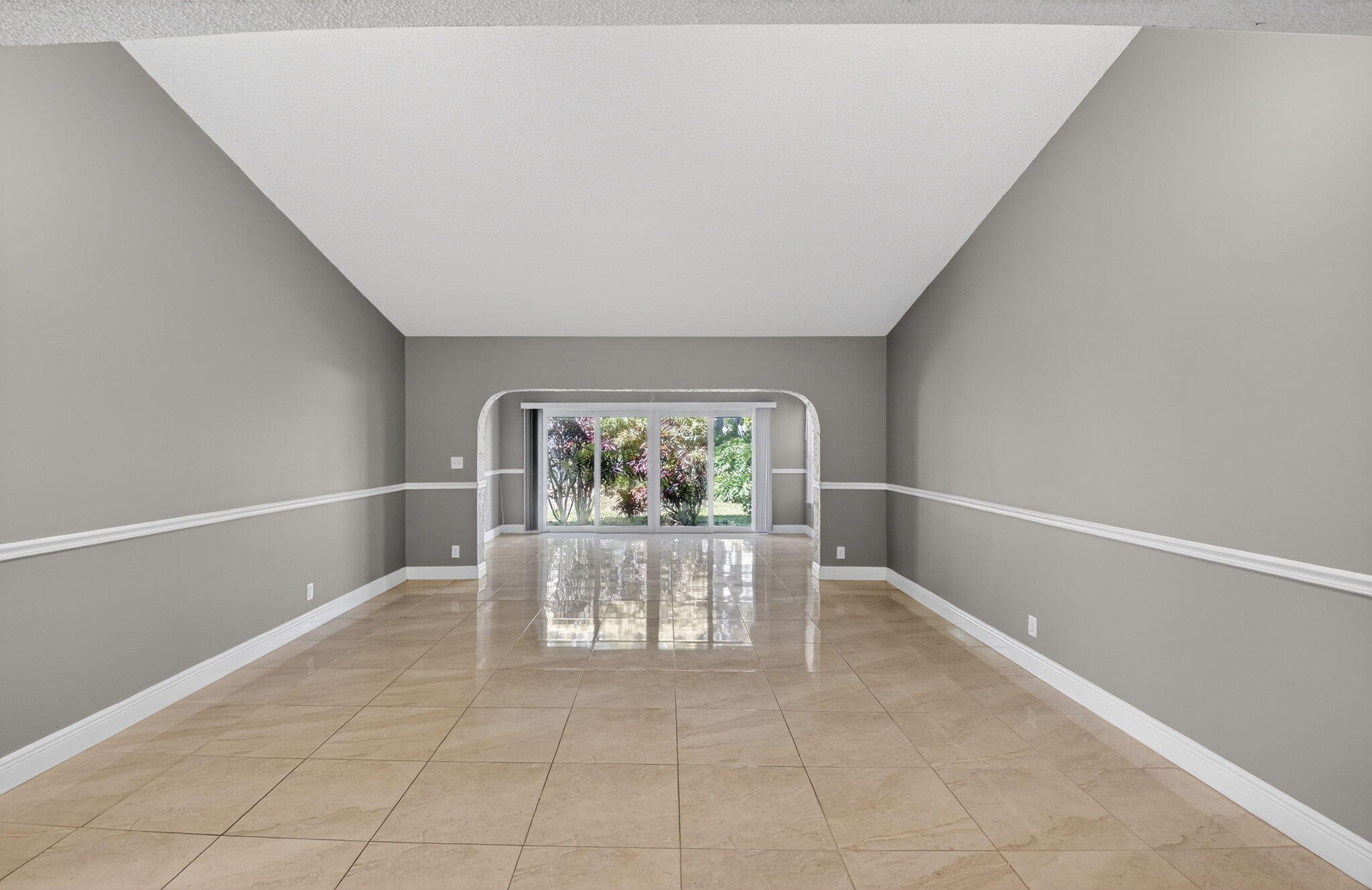 18093 104th Terrace South Boca Raton, FL 33498 - Photo 9 of 43 a dining room with furniture and a window