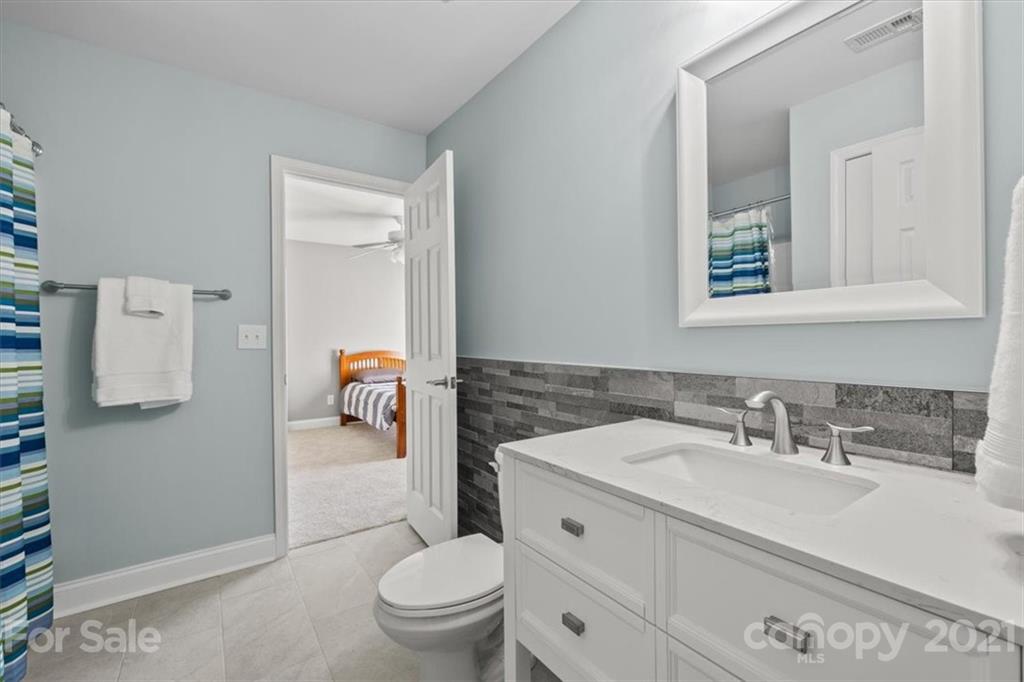 1743 Bentgrass Lane Tega Cay, SC 29708 - Photo 26 of 47 a bathroom with a sink toilet and shower