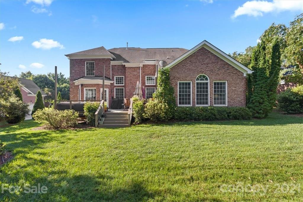 1743 Bentgrass Lane Tega Cay, SC 29708 - Photo 37 of 47 a view of a house with a yard