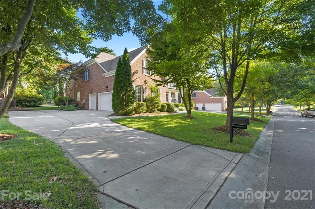 1743 Bentgrass Lane Tega Cay, SC 29708 - Photo 39 of 47 a view of a house with a yard