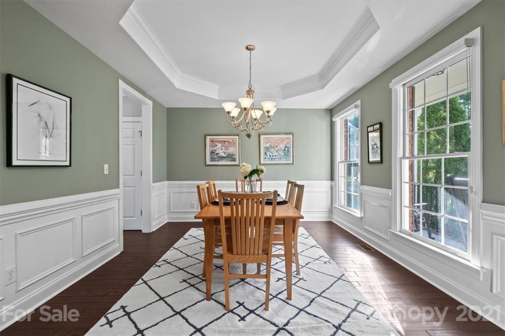 1743 Bentgrass Lane Tega Cay, SC 29708 - Photo 5 of 47 a view of a dining room with furniture window and outside view