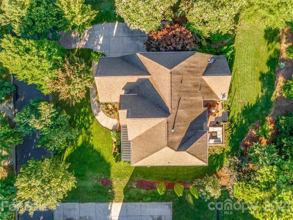 1743 Bentgrass Lane Tega Cay, SC 29708 - Photo 41 of 47 an aerial view of a house with yard and outdoor seating