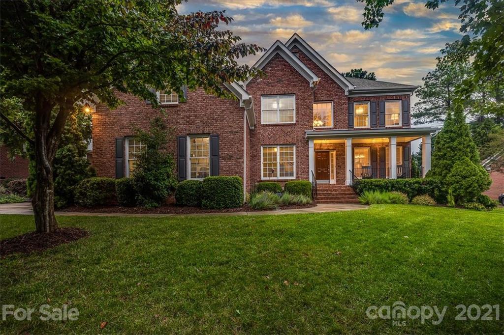 1743 Bentgrass Lane Tega Cay, SC 29708 - Photo 45 of 47 a front view of a house with garden